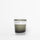 Candle with a 'NETTE' label on a white background