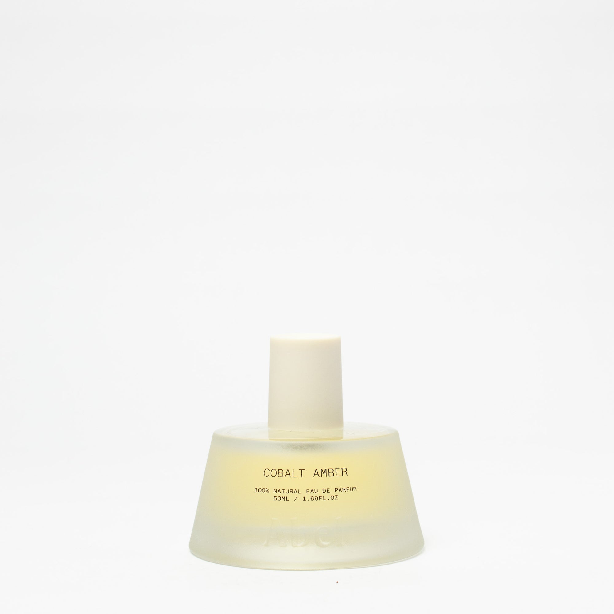 Perfume bottle labeled 'Cobalt Amber' on a white background
