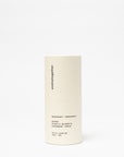 Beige deodorant stick with 'evolvo together' branding on a white background