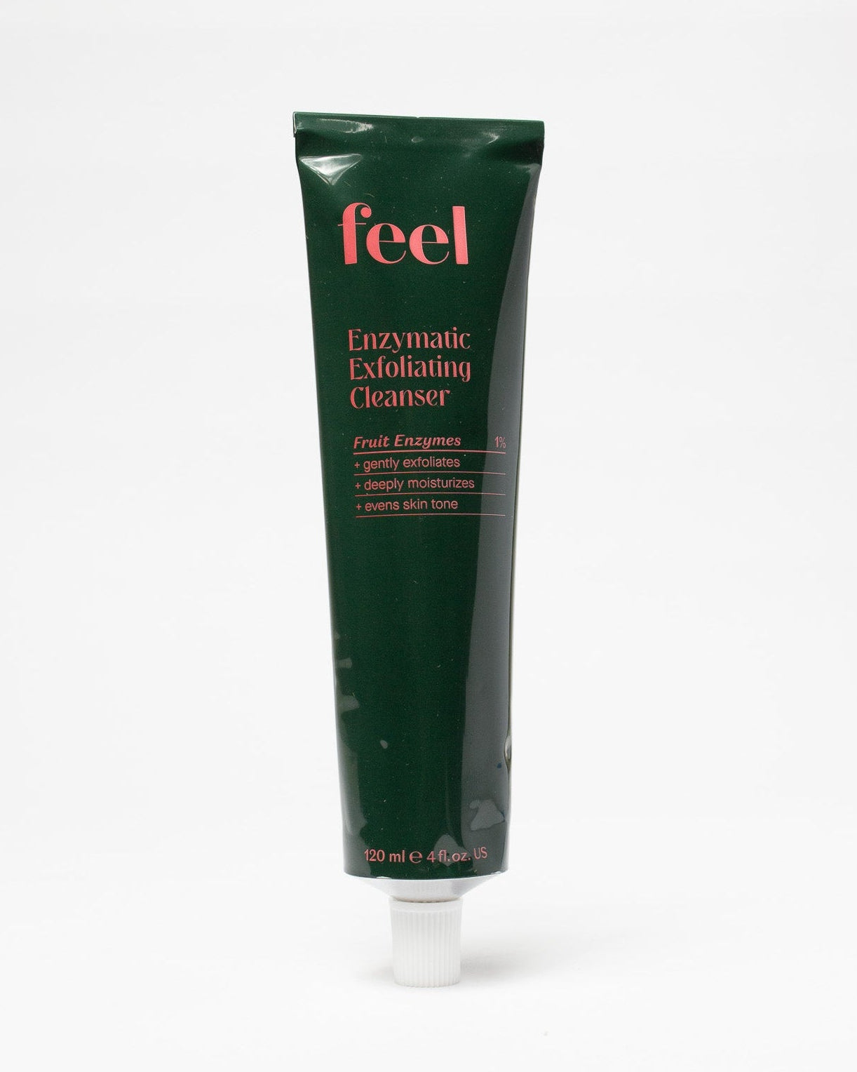 Green tube of 'feel' Enzymatic Exfoliating Cleanser on a white background