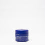 Blue jar of Golden Hour Recovery Cream on a white background