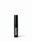 The Sunday Standard NOTO Multi-Bene berry lip and cheek stick in a sleek black aluminum tube.